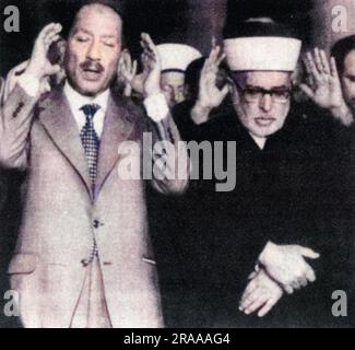 President Anwar Sadat of Egypt(1918-1981) attending prayers at Jerusalem's El Aqsa Mosque. Sadat became the first Arab leader to set foot in Israel in its 29 years of existence when he arrived in Tel Aviv at the start of his two day visit.     Date: Nov-77 Stock Photo