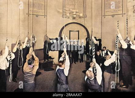 The interior of the ringing chamber at St Paul's Cathedral, London. The fourteen bells of the north tower can be seen here, about to be rung by an all male band of ringers.     Date: 1903 Stock Photo