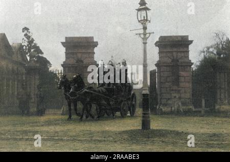 A fire engine leaving the main gates of the Middlesex Pauper Lunatic Asylum at Colney Hatch, near Friern Barnet, Middlesex (North London), 1903.     Date: 1903 Stock Photo