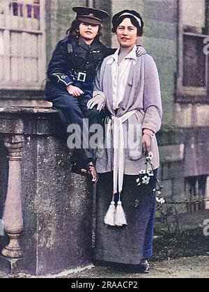 The Marchioness of Headfort, formerly known to playgoers as Miss Rose (Rosie) Boote of the Gaiety Theatre, London. She married the Marquess in April 1901, and her son became the Earl of Bective.  Pictured here at her home, Headfort House in Co. Meath with her daughter Lady Millicent Taylour who is wearing a miniature military uniform.  The Tatler reports that she 'is a most energetic worker on behalf of our troops and is collecting and working on behalf of the Co. Meath Fund for Soldiers and Sailors.'     Date: 1915 Stock Photo