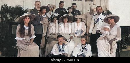 The Russian and Romanian royal families, pictured during the former's visit to Constanza, on the Romanian coast. From left, going around the back: Grand Duchess Maria of Russia, Carol I, King of Romania, Grand Duchess Anastasia of Russia, Princess Marie of Romania, Prince Carol of Romania, Crown Prince Ferdinand of Romania, Queen Elizabeth of Romania, Czar Nicholas II, Grand Duchess Tatiana of Russia with the baby Prince Mircia of Romania. Seated in the centre are the Czarina of Russia, Grand Duchess Olga of Russia, Princess Ileana of Romania, Crown Princess of Romania. Sitting at the front ar Stock Photo