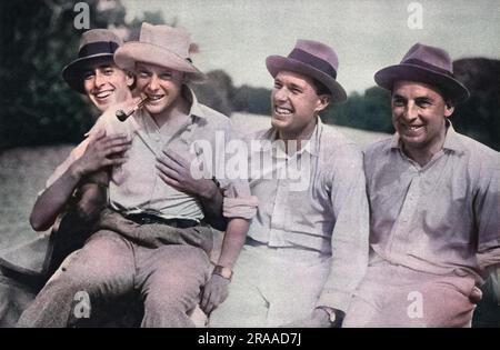 Edward, Prince of Wales (1894-1972), later King Edward VIII and Duke of Windsor, pictured enjoying a moment of relaxation while out tarpon fishing at Colon during his royal tour of 1920.  He is seated on the knee of his friend and cousin, Lord Louis Mountbatten along with two other friends from H.M.S. Renown.     Date: 1920 Stock Photo