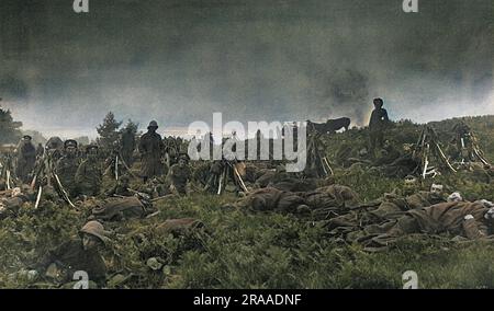 Dawn,' photographed by Cooke showing British troops, who have slept in the open country waking up to a misty morning in Flanders.     Date: 1914 Stock Photo