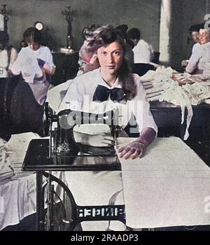 Princess Margaretha, aged fifteen years old, the eldest daughter of Prince Carl of Sweden, brother of the King of Sweden, brother of the King of Sweden, and Princess Ingeborg, daughter of King Frederick of Denmark, pictured at a sewing machine for the Red Cross Society during the early weeks of the First World War.     Date: 1914 Stock Photo