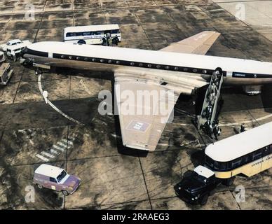 Passengers alighting from a British European Airways (BEA) Comet 4B plane at London Heathrow Airport, England.     Date: 1960s Stock Photo