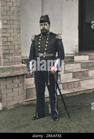 An unidentified man in ceremonial naval costume, complete with epaulettes and sword. Stock Photo