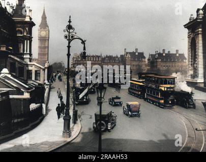 View from Waterloo of traffic crossing Westminster Bridge. St StephenÆs Tower, part of the houses of Parliament, can be seen in the background. Stock Photo