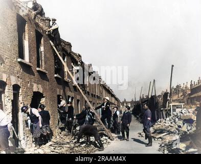 Bomb damage in Sidney Street, East London, WW2.  Both sides of the entire street were shattered by two bombs.     Date: 1940 Stock Photo