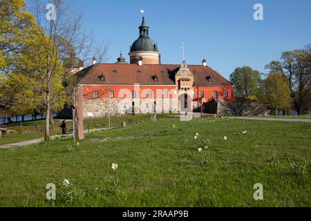 GRIPSHOLM CASTLE, SWEDEN ON MAY 12, 2023. View of the Castle, Main Entry, park, flowers, and unidentified people. Editorial use. Stock Photo