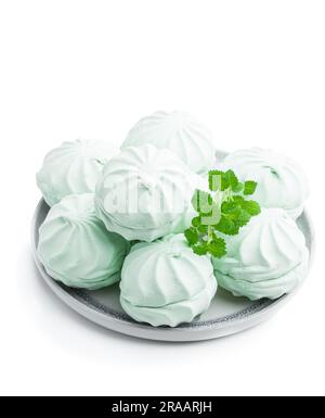 Mint  marshmallows on ceramic plate isolated on white Stock Photo