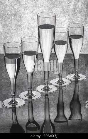 Still life with glassware on a reflective surface Stock Photo