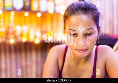 Cebu,The Philippines-January 20th 2023: Along the waterfront of the popular scuba diving and snorkelling resort,many small bars line the pathway next Stock Photo