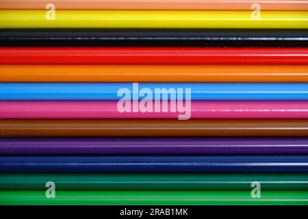 Linear multicolored background of bright colored pencils Stock Photo