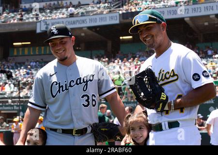 Chicago White Sox catcher Carlos Perez and second baseman Josh Harrison  celebrate the team's 3-2 win over the Minnesota Twins after a baseball game  Monday, Oct. 3, 2022, in Chicago. (AP Photo/Charles