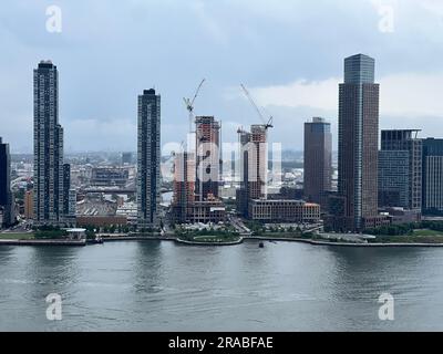 New high rice buildings continue to be built on the Queens waterfront along the East River directly across from 34th Street in Manhattan. Stock Photo