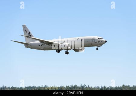 Oak Harbor, WA, USA - June 29, 2023; United States Navy Boeing P-8 on final approach with landing gear Stock Photo