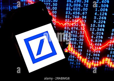 In this photo illustration, a Deutsche Bank logo is seen displayed on a smartphone . Stock Photo