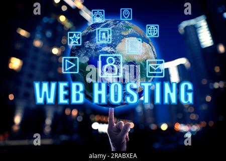 Web hosting. Man touching globe with icons against blurred cityscape, closeup Stock Photo