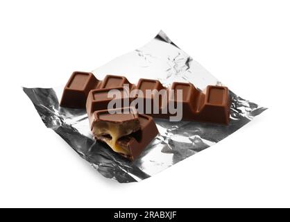 Bars of chocolate in gold foil, isolated on a white background Stock Photo  - Alamy