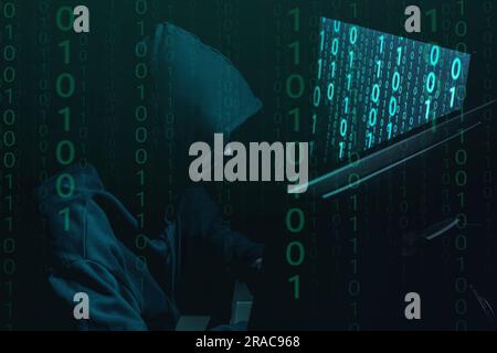 Anonymous man with computers and binary code in darkness Stock Photo