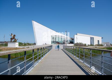 Sculpture park at Arken museum at Ishoj, denmark, in the evening sun - a museum for contemporary art near Copenhagen Stock Photo