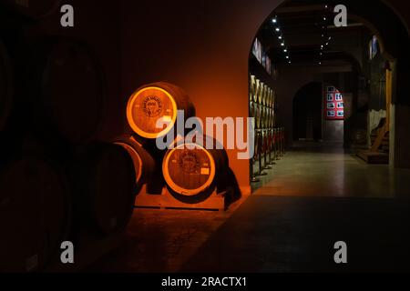 Yerevan, Armenia - May 28 2023: Cellar of the Ararat brandy factory in Yerevan. Barrels of cognac in the cellar. Stock Photo