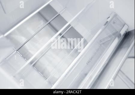 An empty refrigerator. Inside an empty, clean refrigerator, a refrigerator compartment after defrosting. shot with a wide angle lens Stock Photo