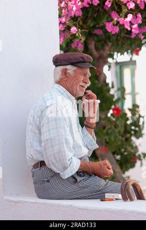 cigarette prices in santorini ABOVE BLUE SUITES Close-up of an elderly Greek