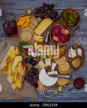 Vegetarian Easter brunch with various breads, eggs, cheese, fruit and gherkins Stock Photo