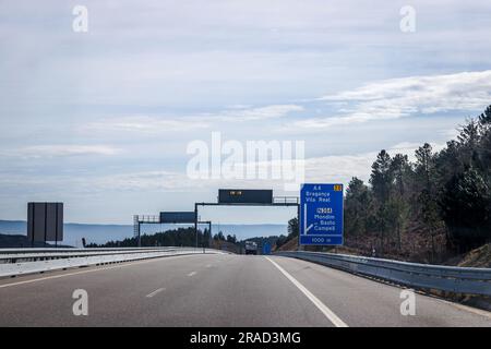 Image of section of the A4 motorway, transmontana motorway, Porto, Vila Real, Portugal. Information board, directions. Beautiful day with high clouds. Stock Photo