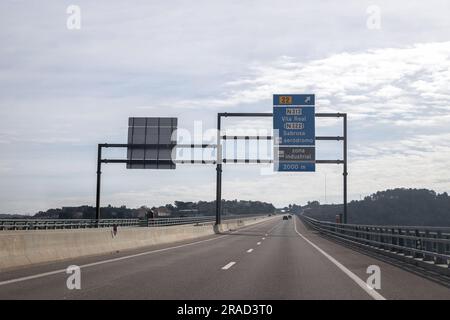 Image of section of the A4 motorway, transmontana motorway, Porto, Vila Real, Portugal. Information board, directions. Beautiful day with high clouds. Stock Photo