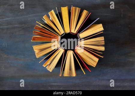 hardcover books layed out as a star, top view, education,knowledge,learning concept Stock Photo