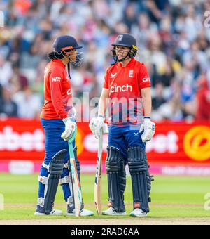 England's Sophia Dunkley and captain Heather Knight between overs in the First Vitality IT20 between England and Australia Stock Photo