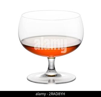 Transparent crystal clear glass filled with delicious cognac drink isolated on white background Stock Photo