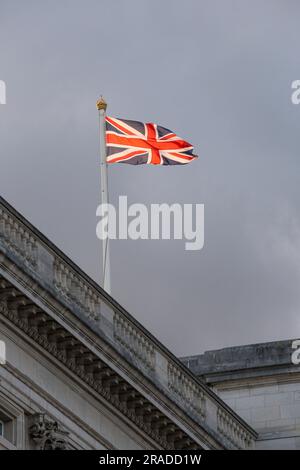Union Jack Flag flying full mast at Buckingham Palace London Stock Photo