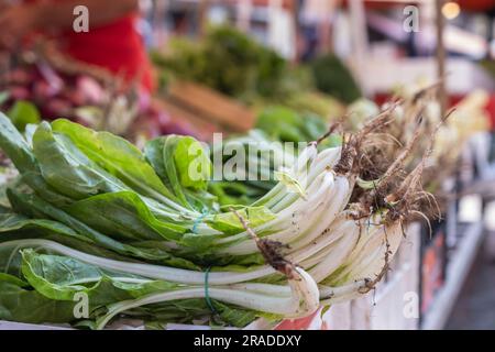 Spinach on the food market stall Ballaro in Palermo, Sicily Stock Photo