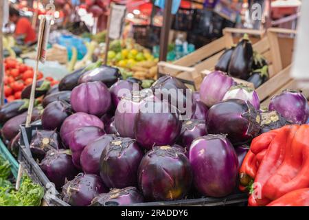 Aubergines on vegetable stall of food market Ballaro in Palermo, Sicily Stock Photo