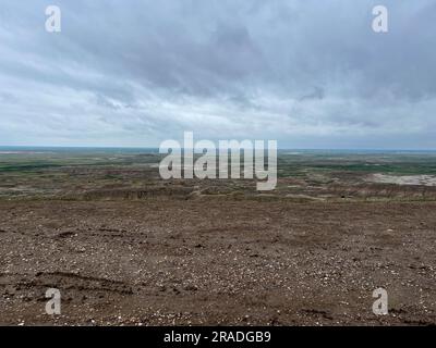 A View of the mountains of Badlands National Park in Wall, SD on a cloudy day. Stock Photo