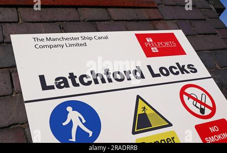 Signage for Latchford Locks on the Manchester Ship Canal operated by Peel Ports, Warrington, Cheshire, England Stock Photo