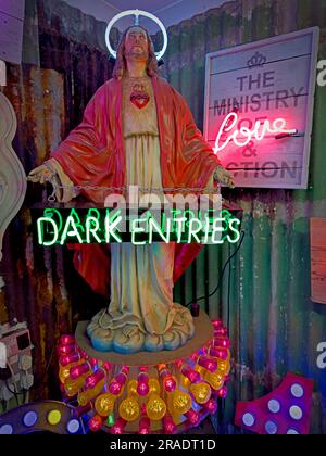 Jesus statue buddy Christ, with neon light design - The Ministry of Love & Action, Dark Entries Stock Photo