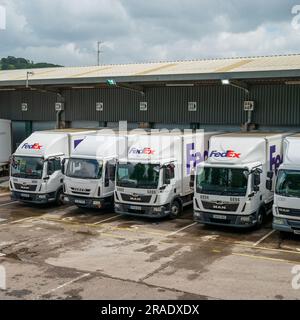 FedEx delivery vehicles at their depot in Ramsbottom. Stock Photo