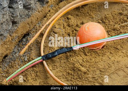 Modern fiber optic cable for a house connection Stock Photo