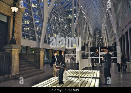 Toronto, Ontario / Canada - Oct 17, 2008: A photo exhibition at night in the lobby of a financial bank building Stock Photo