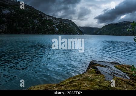 Amazing nature view with fjord and mountains. Beautiful reflection. Location: Scandinavian Mountains, Norway. Artistic picture. Beauty world. The feel Stock Photo