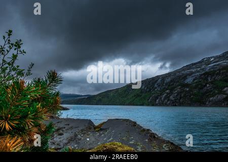 Amazing nature view with fjord and mountains. Beautiful reflection. Location: Scandinavian Mountains, Norway. Artistic picture. Beauty world. The feel Stock Photo