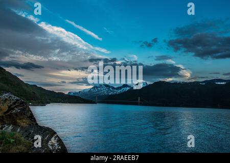 Amazing nature view with fjord and mountains. Beautiful reflection. Location: Scandinavian Mountains, Norway. Artistic picture. Beauty world. The feel Stock Photo