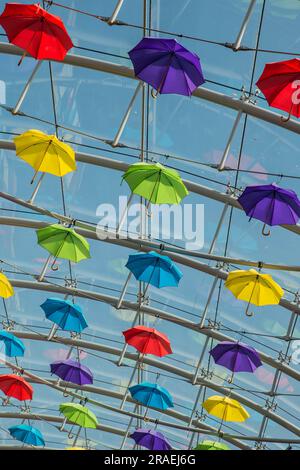 Colourful umbrella display in the roof of the Princess Hay shopping centre in Exeter, Devon, England Stock Photo