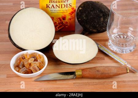 Black radish, root, and brown candy (Raphanus sativus), sugar, ingredients for cough syrup Stock Photo