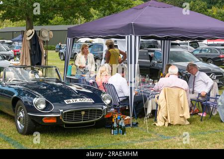 Henley Royal Regatta 2023 Spectators enjoying their luncheon break interval during  the Henley Royal Regatta in Lion Meadow -a 6 day reserved  car spa Stock Photo