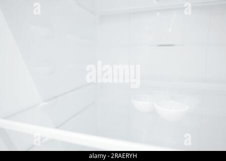 An empty refrigerator. Inside an empty, clean refrigerator, a refrigerator compartment after defrosting. shot with a wide angle lens Stock Photo